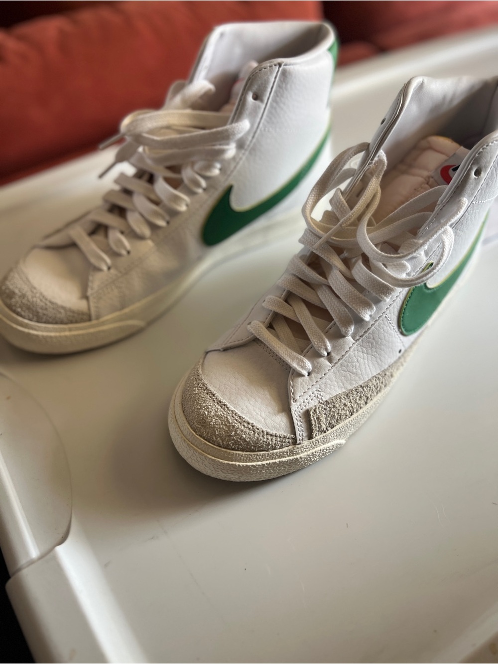 Nike White High-Top Sneakers with Green Swoosh